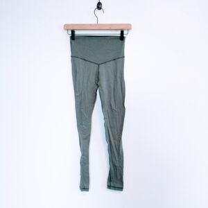 Aerie green chill play move leggings, high waisted with some mild piling in crot